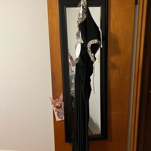 Very sexy black formal size 2 you’re gonna love it and so will he